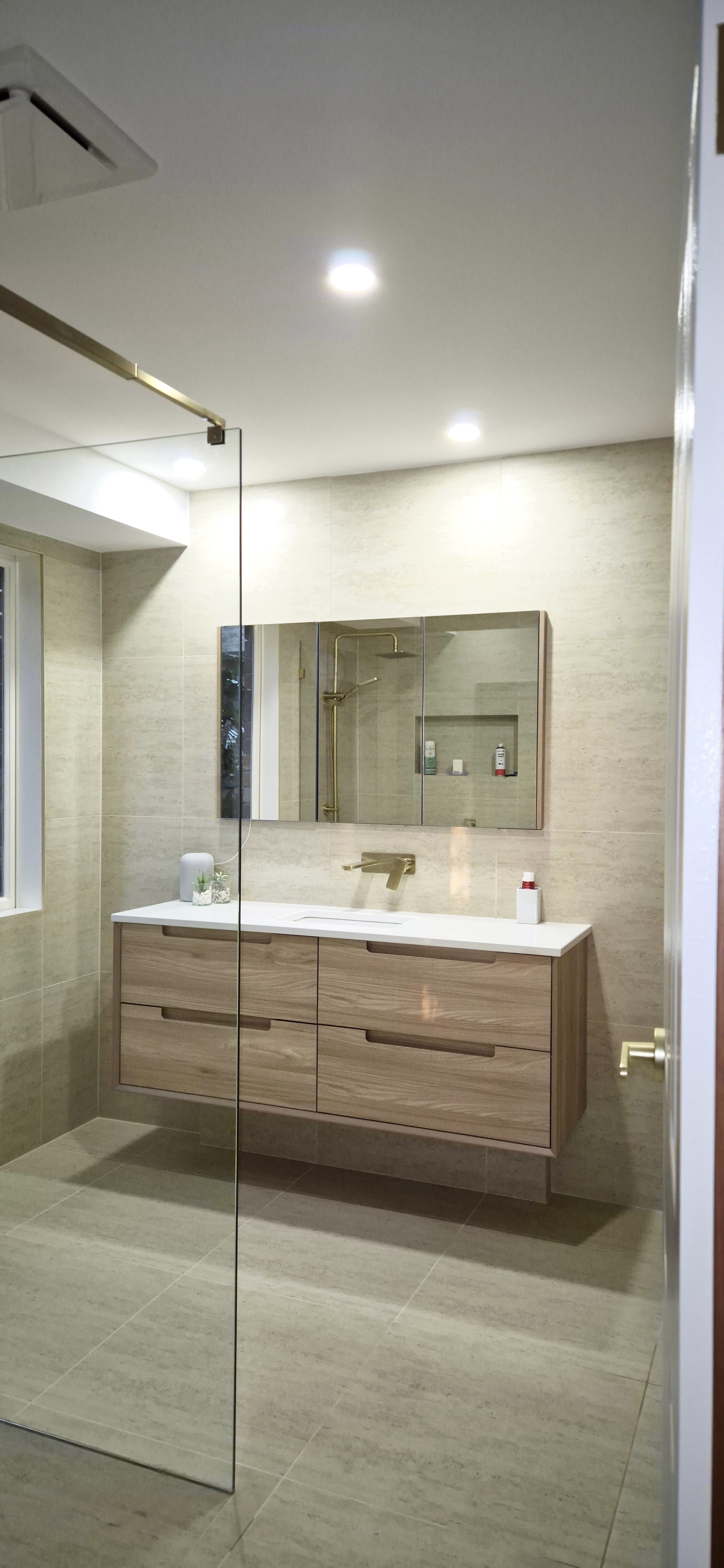 Frameless Shower Panel with our Brushed Gold Hardware